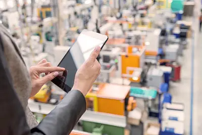 A warehouse buzzing with automated systems, showcasing the seamless integration of automation into supply chain management facilitated by Ryodo Automation